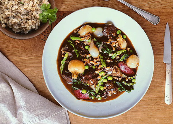 Beef ragout with spring vegetables and buckwheat