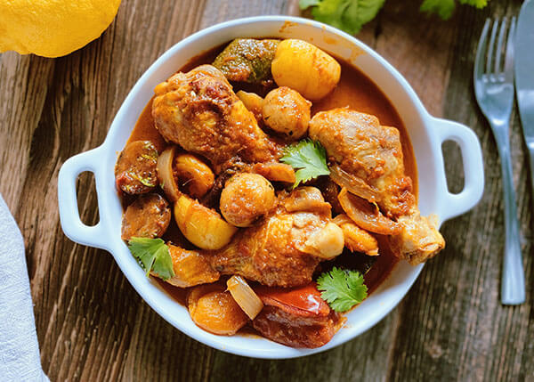 Moroccan chicken tagine with potatoes, apricots and lemons