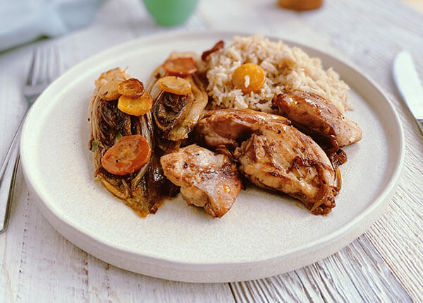 Soft lemon chicken, endives and carrots with orange and rice