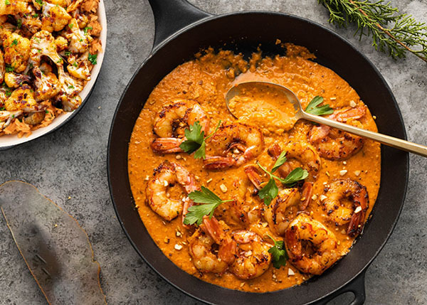 Spanish-style prawns, creamy red pepper sauce, cauliflower