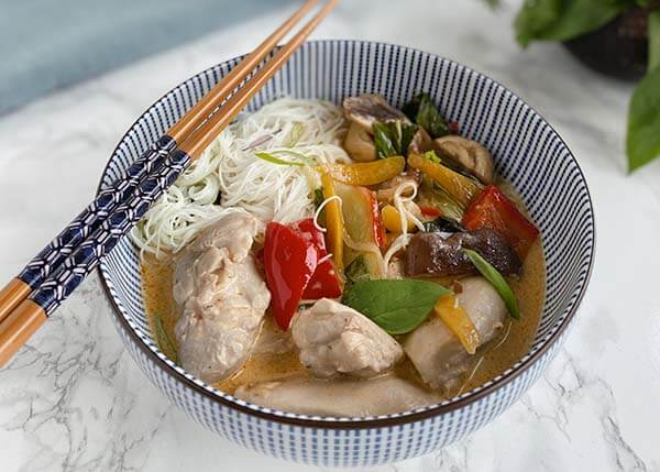 Chicken laksa, rice vermicelli with sauteed vegetables