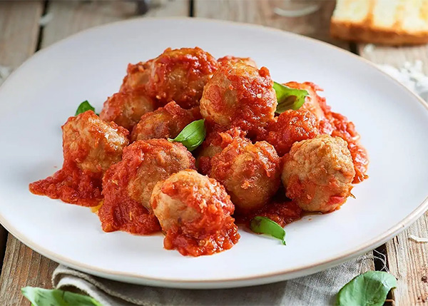 Chicken keftas with lemon and coriander, smoked tomato concassé