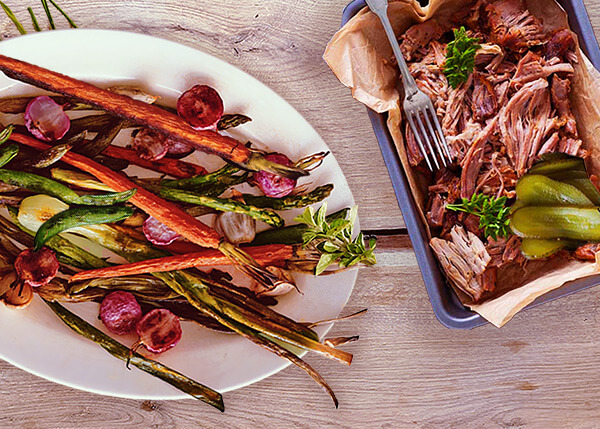Pulled beef cheek with barbecue sauce, roasted vegetables primavera
