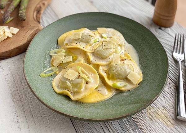 Green asparagus ravioli with parmesan cream