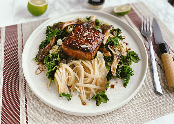 Teriyaki salmon, pan-fried kale, oyster mushrooms and rice noodles