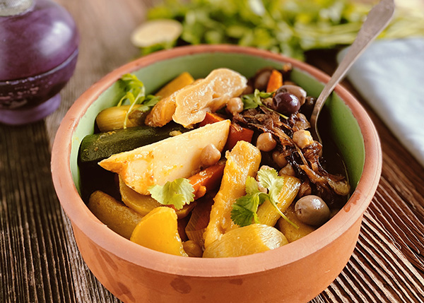 Winter vegetable tagine, potatoes, onion confit, raisins with olives and lemon