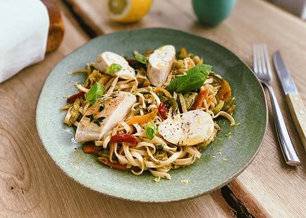 Lemon thyme chicken, and noodles with autumn vegetables saute